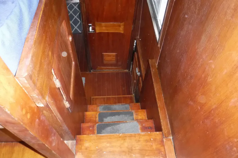 Slide: The Image of Wooden interior stairs of 1988 Dudley Dix Echo 38 sailboat. - 18