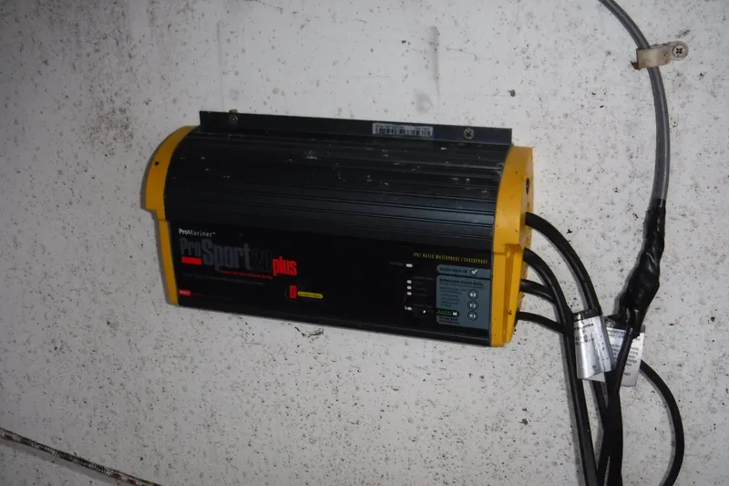 Slide: The Image of ProMariner ProSport 20 Plus battery charger mounted on a wall, Dudley Dix Echo 38, 1988. - 21