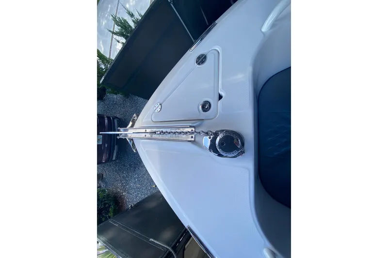 Slide: The Image of 2006 Everglades 290 Center Console boat deck with anchor chain and winch. - 15