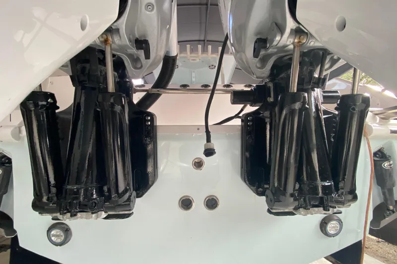 Slide: The Image of Close-up of 2006 Everglades 290 Center Console boat engine components. - 32