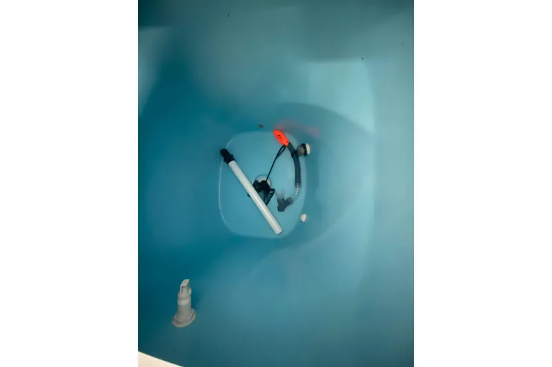 Slide: The Image of Interior view of a 2006 Everglades 290 Center Console boat compartment. - 39