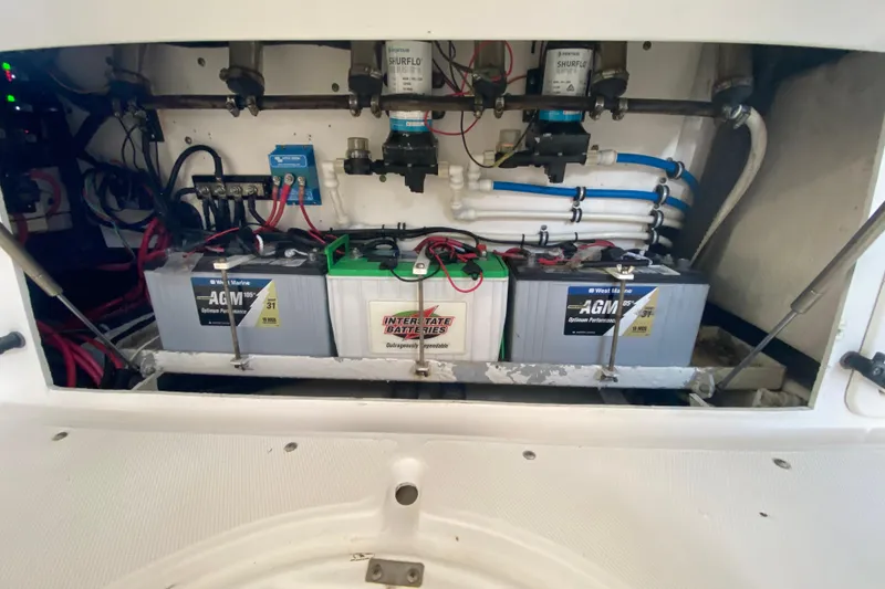 Slide: The Image of Battery compartment of a 2006 Everglades 290 Center Console boat with AGM and Interstate batteries. - 41