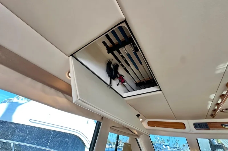 Slide: The Image of Luxurious bathroom in 2005 Riviera 47 Open Flybridge yacht, featuring modern amenities and elegant design. - 19