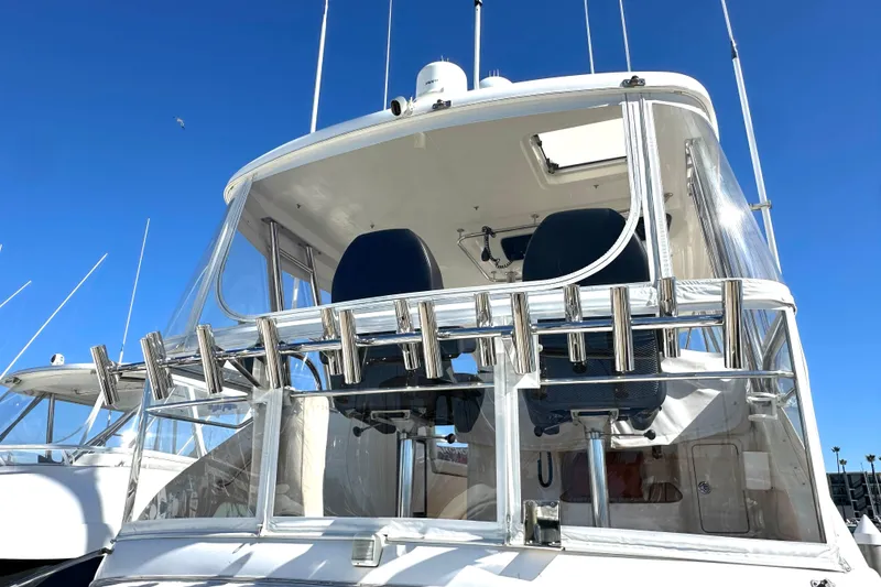 Slide: The Image of Ceiling view of 2005 Riviera 47 Open Flybridge interior with fishing rod storage. - 21