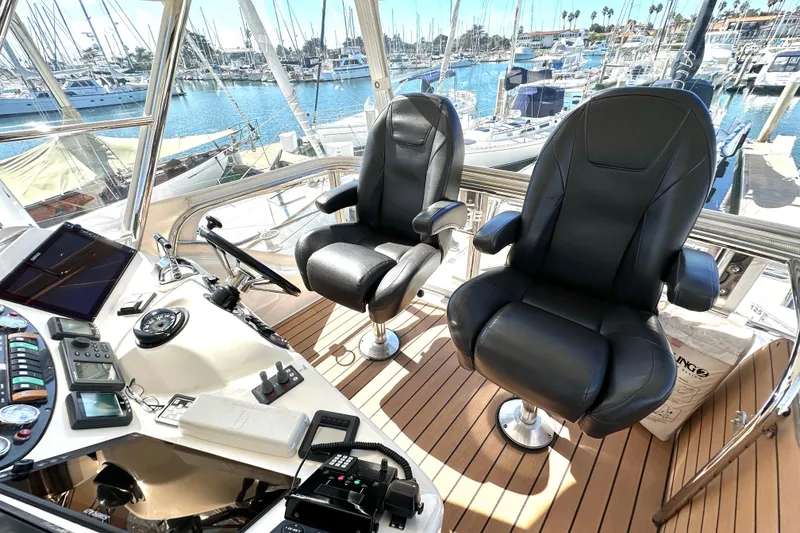 Slide: The Image of 2005 Riviera 47 Open Flybridge interior with ladder and hatch detail. - 23