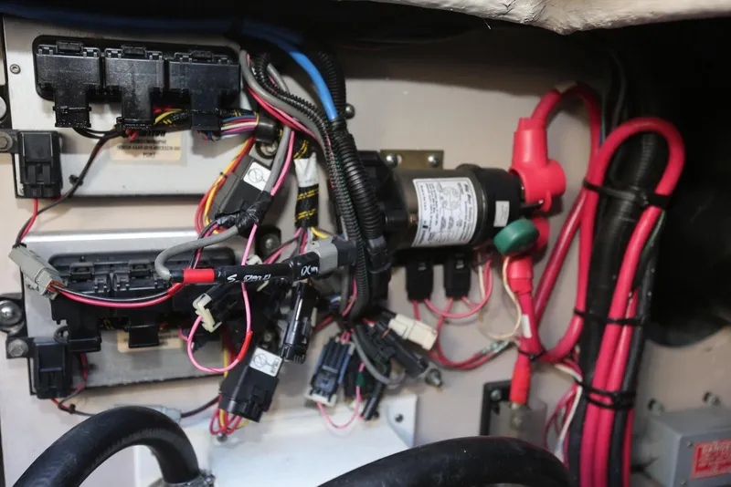 Slide: The Image of Electrical wiring and components inside a 2004 Sea Ray 420 Sedan Bridge boat. - 115