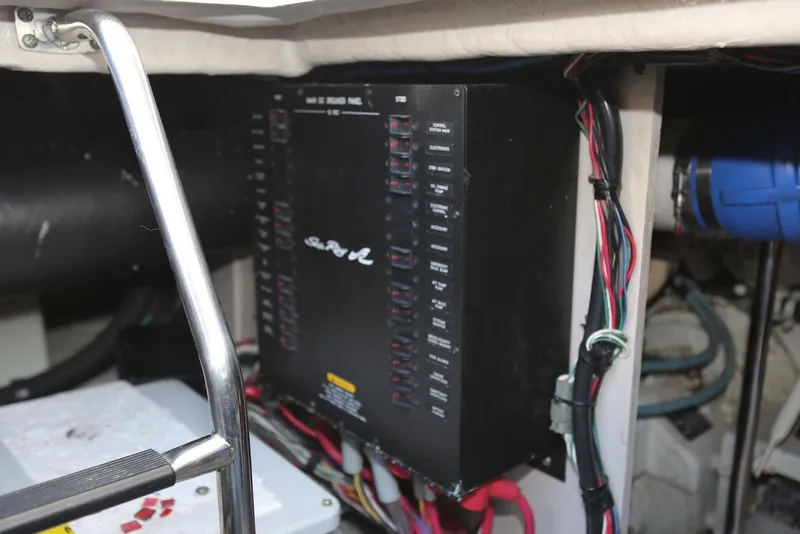 Slide: The Image of Electrical panel in a 2004 Sea Ray 420 Sedan Bridge boat engine room. - 116