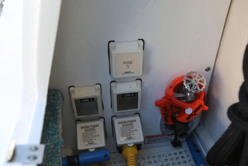 Slide: The Image of Electrical panel and water valve on 2004 Sea Ray 420 Sedan Bridge yacht. - 16