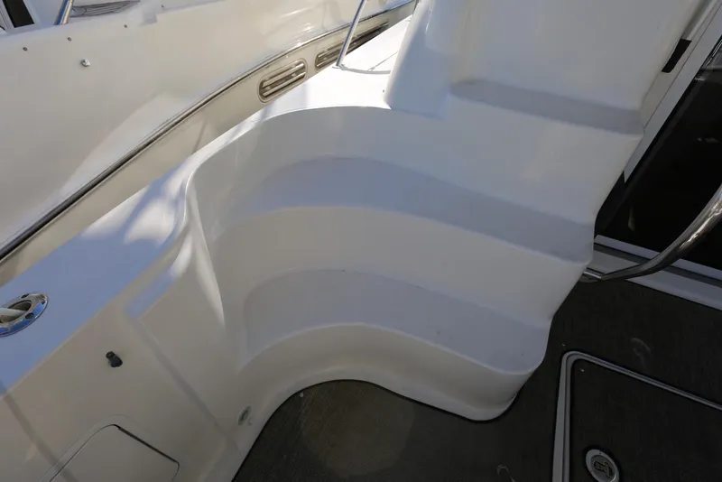 Slide: The Image of Staircase on 2004 Sea Ray 420 Sedan Bridge yacht, featuring sleek white design. - 20
