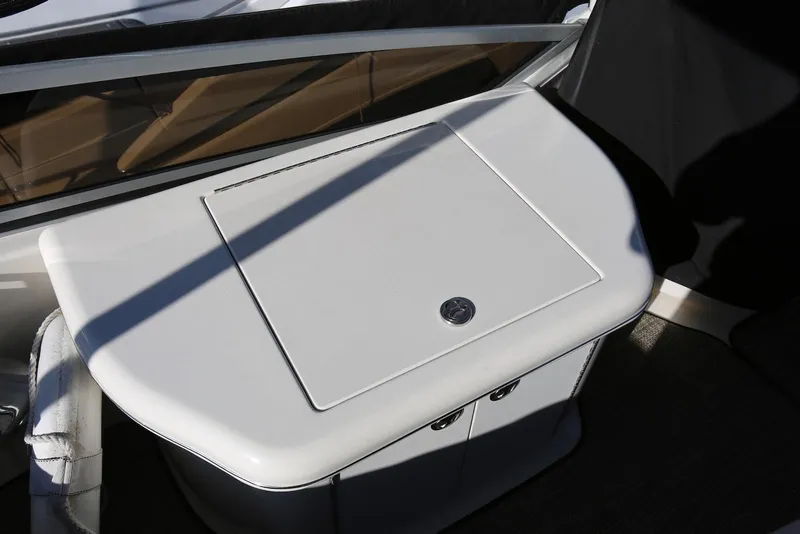 Slide: The Image of 2004 Sea Ray 420 Sedan Bridge boat interior detail with sleek white surface. - 53