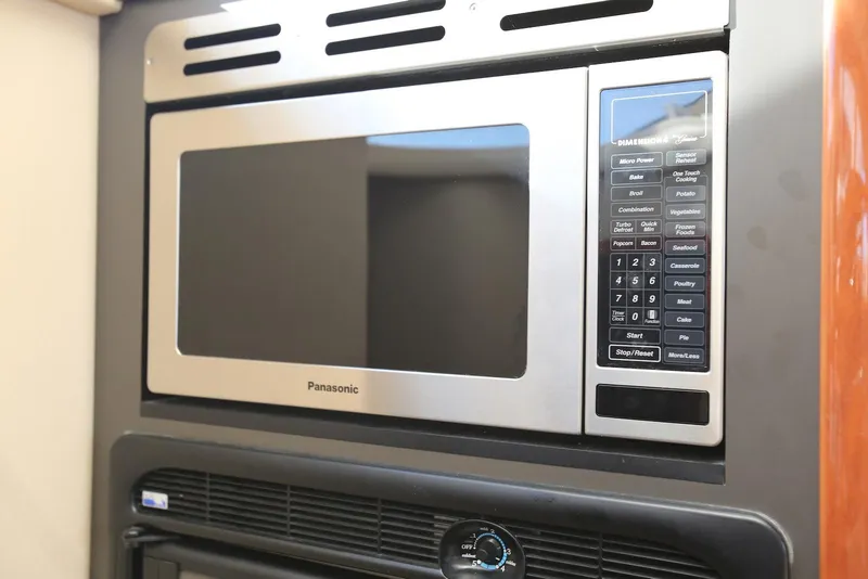 Slide: The Image of Panasonic microwave in 2004 Sea Ray 420 Sedan Bridge yacht kitchen. - 76