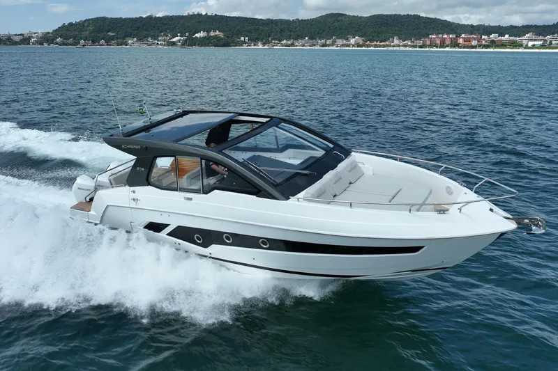Slide: The Image of 2026 Schaefer 375 yacht cruising on open water, showcasing sleek design and luxury features. - 1
