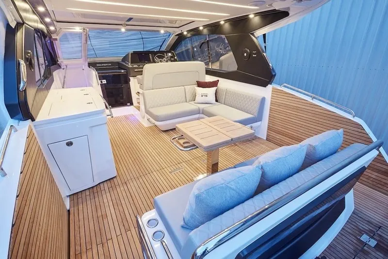 Slide: The Image of Luxurious 2026 Schaefer 375 yacht interior with elegant seating and modern design. - 15