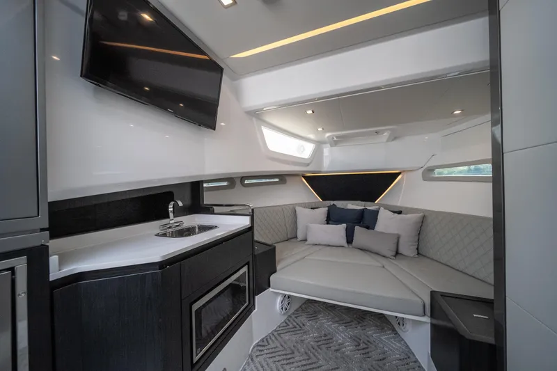 Slide: The Image of Luxurious interior of 2026 Schaefer 375 yacht with modern seating and kitchenette. - 22