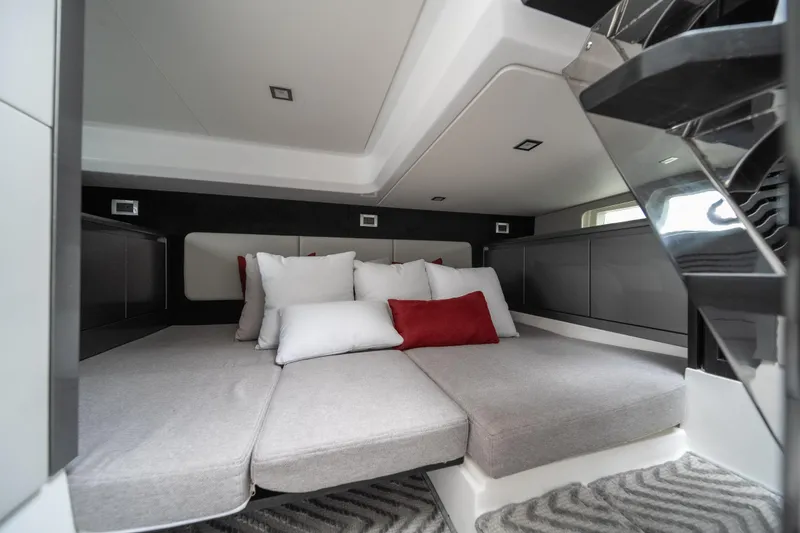 Slide: The Image of Luxurious interior of 2026 Schaefer 375 yacht with modern bedding and sleek design. - 26