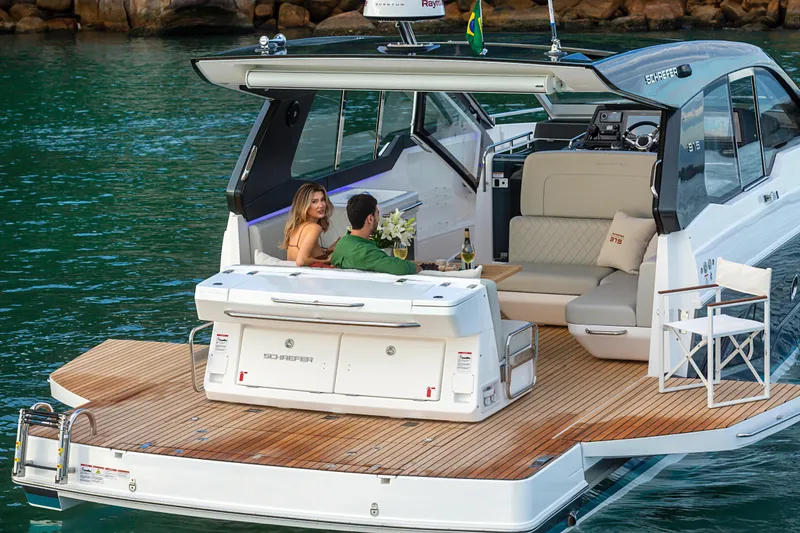 Slide: The Image of Luxury Schaefer 375 yacht, 2026 model, with elegant deck and seating area on water. - 29
