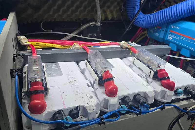 Slide: The Image of Electrical system of a 1993 Amel Santorin yacht with batteries and wiring. - 35