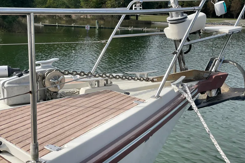 Slide: The Image of Bow of 1993 Amel Santorin sailboat with anchor and chain on deck. - 4