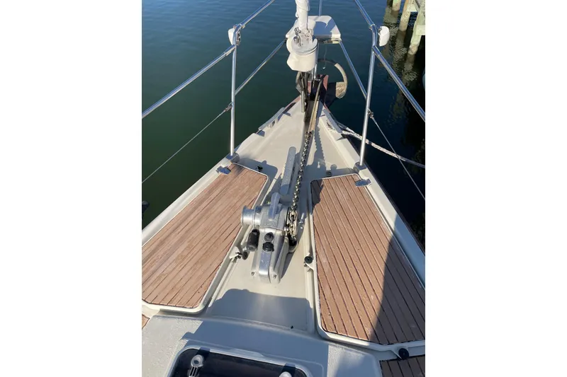 Slide: The Image of Bow of 1993 Amel Santorin sailboat with anchor and teak decking. - 5