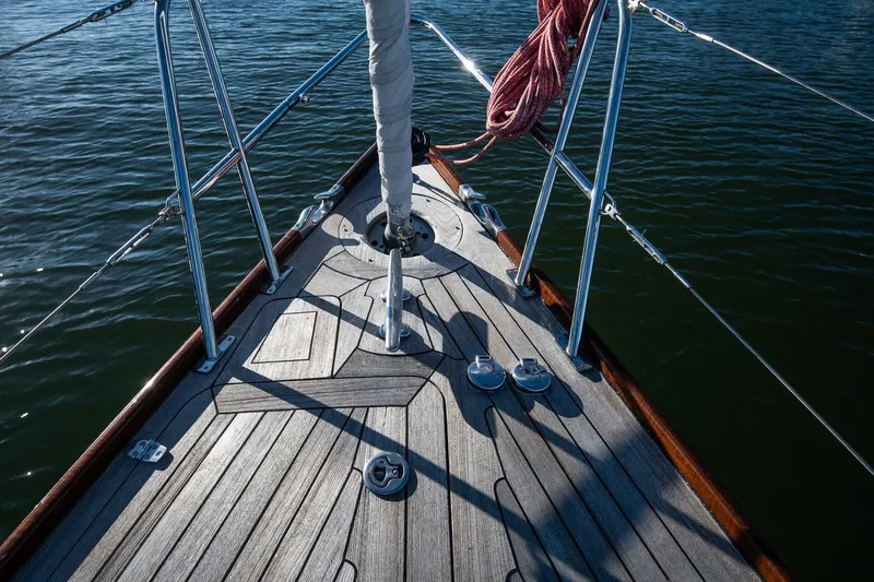 Slide: The Image of Bow of 2007 Morris Yachts M42 sailboat with teak deck and stainless steel fittings. - 11