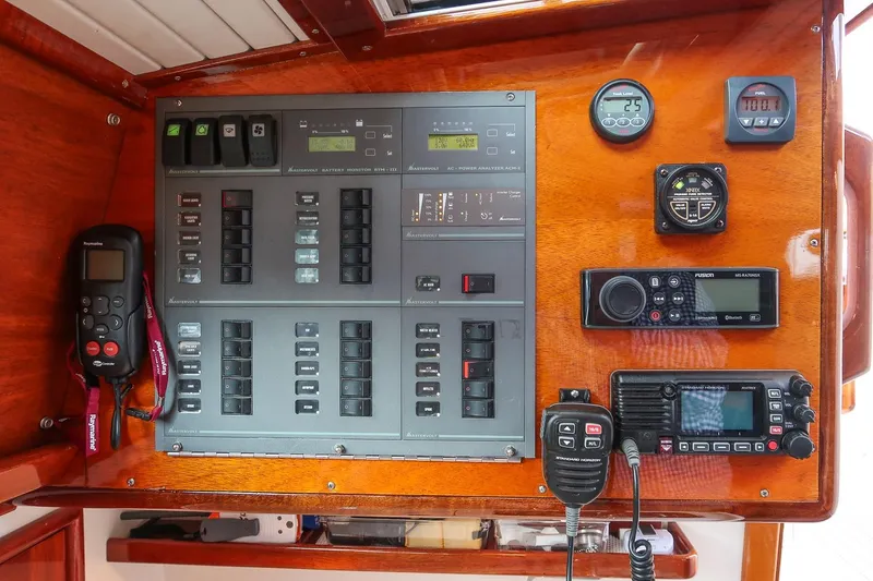 Slide: The Image of Control panel of a 2007 Morris Yachts M42, featuring navigation and communication equipment. - 28