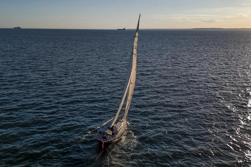 Slide: The Image of Sailing yacht Morris M42 (2007) gliding on open sea at sunset. - 33