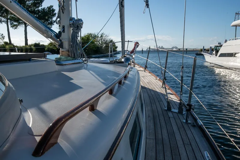 Slide: The Image of 2007 Morris Yachts M42 sailboat deck with scenic waterfront view. - 9