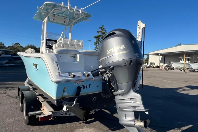 Slide: The Image of 2019 Sea Hunt Ultra 225 boat with Yamaha engine on trailer. - 4