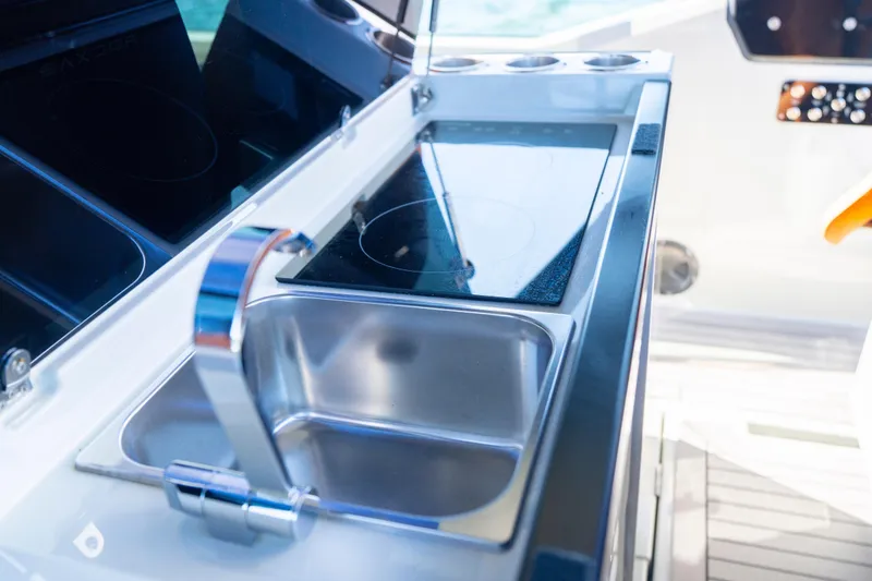 Slide: The Image of Saxdor 320 GTO 2021 boat kitchen with sink and stove. - 24