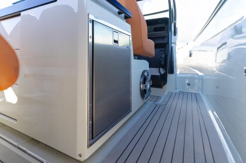 Slide: The Image of Interior view of 2021 Saxdor 320 GTO boat, featuring sleek design and modern amenities. - 25