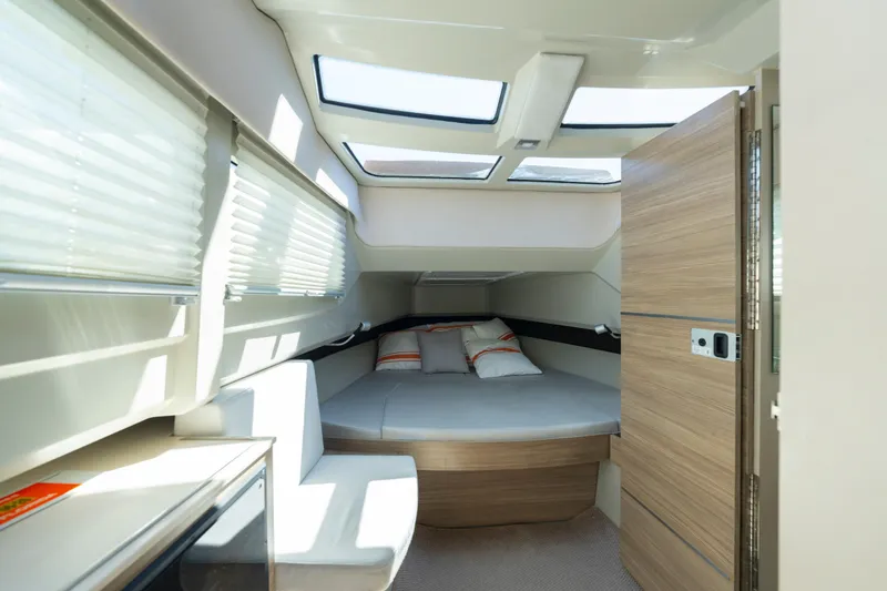 Slide: The Image of Interior of 2021 Saxdor 320 GTO boat with modern cabin design and skylights. - 39