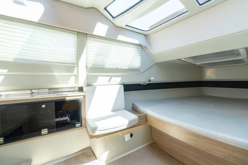 Slide: The Image of Interior of 2021 Saxdor 320 GTO boat, featuring modern design and comfortable seating. - 41
