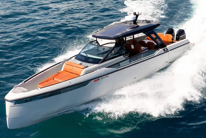 Slide: The Image of 2021 Saxdor 320 GTO cruising on open water, showcasing sleek design and powerful performance. - 52