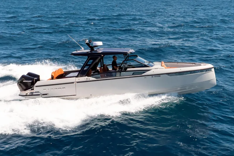 Slide: The Image of 2021 Saxdor 320 GTO cruising on open sea with powerful outboard engines. - 53