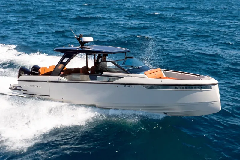 Slide: The Image of 2021 Saxdor 320 GTO cruising on open sea with sleek design and powerful engines. - 54