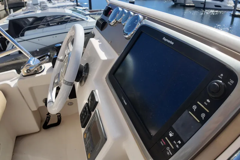 Slide: The Image of Cockpit of 2012 Azimut 40 FLY yacht with steering wheel and navigation system. - 20