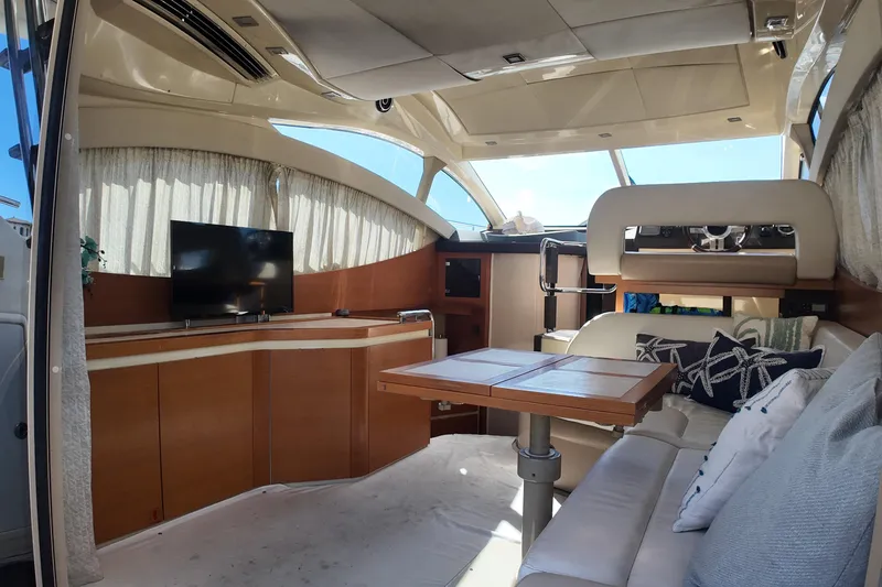 Slide: The Image of Luxurious interior of 2012 Azimut 40 FLY yacht with modern furnishings and entertainment system. - 26