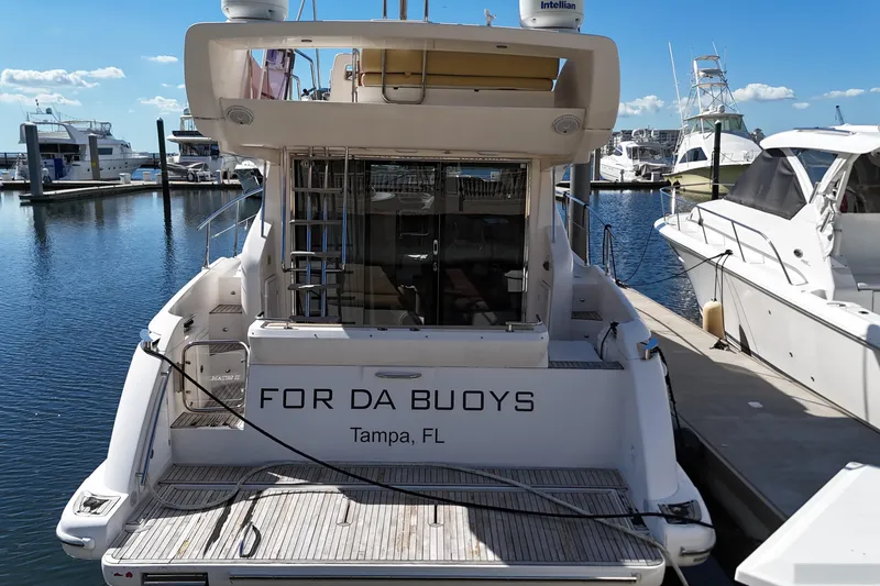 Slide: The Image of Azimut 40 FLY 2012 yacht docked in Tampa marina, rear view. - 3