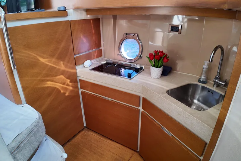 Slide: The Image of Luxurious 2012 Azimut 40 FLY yacht kitchen with modern amenities and elegant design. - 30