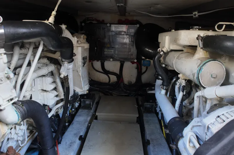 Slide: The Image of Engine room of a 2012 Azimut 40 FLY yacht, showcasing dual engines and mechanical components. - 41