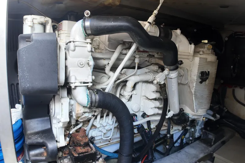 Slide: The Image of Engine compartment of a 2012 Azimut 40 FLY yacht, showcasing mechanical components. - 42