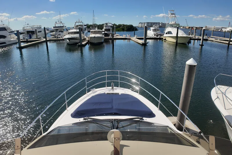 Slide: The Image of Bow view of 2012 Azimut 40 FLY yacht docked in a sunny marina. - 7
