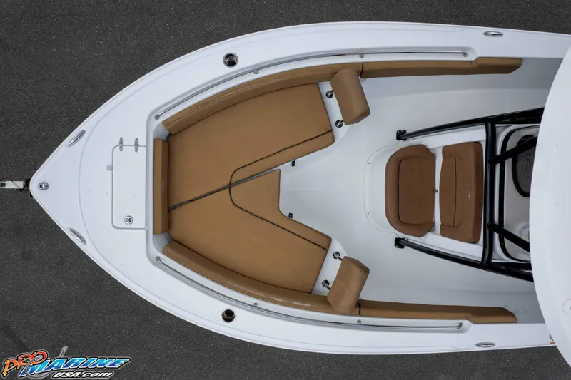 Slide: The Image of 2022 Sea Hunt Ultra 229 boat interior with tan seating, top view. - 34