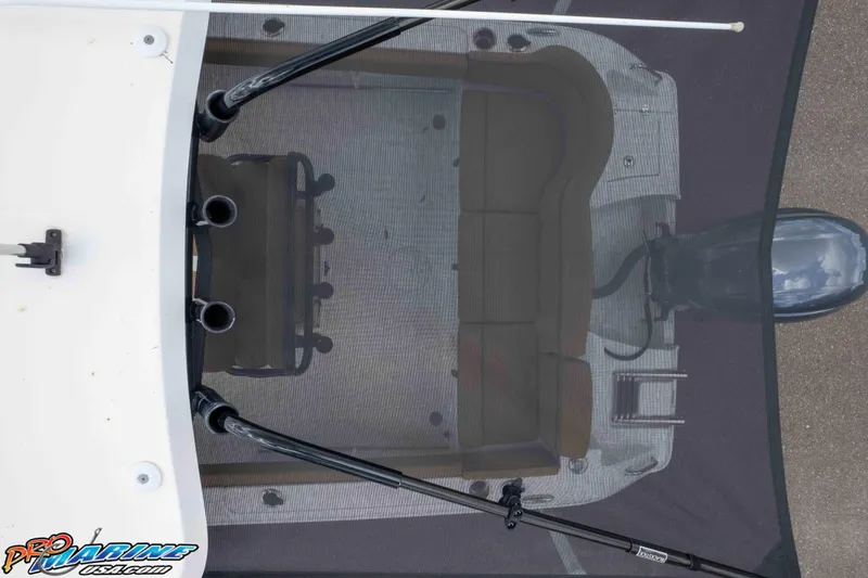 Slide: The Image of Overhead view of 2022 Sea Hunt Ultra 229 boat interior and motor. - 36