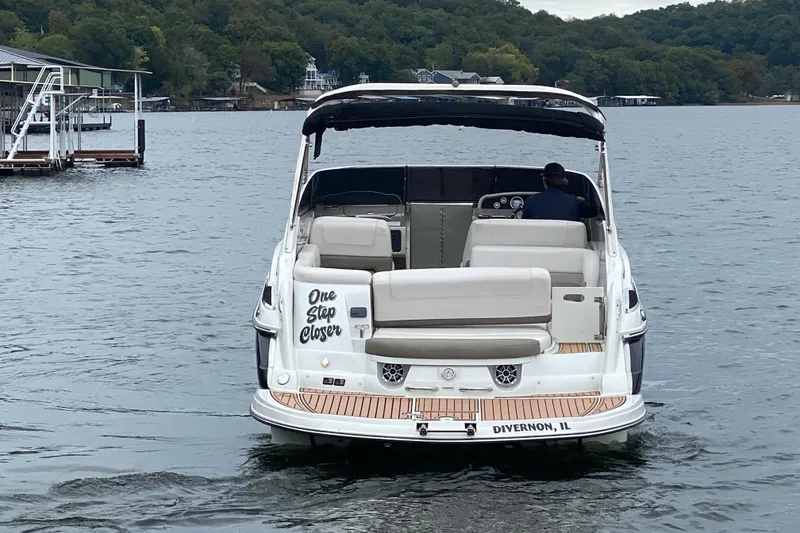 Slide: The Image of 2015 Crownline 335 SS boat cruising on a lake near Divernon, IL. - 3