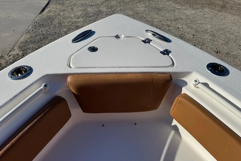 Slide: The Image of 2026 Key West 239 FSR boat with luxurious tan leather seating and armrests. - 14