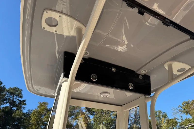 Slide: The Image of 2026 Key West 239 FSR boat with speaker and rod holders, viewed from below. - 7