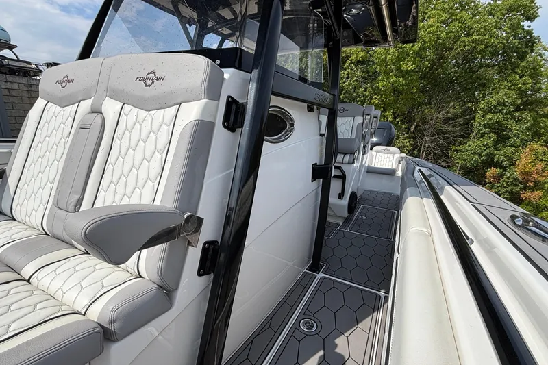 Slide: The Image of 2022 Fountain 38 SC boat interior with luxurious seating and modern design. - 17