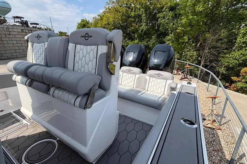Slide: The Image of 2022 Fountain 38 SC boat interior with luxurious seating and dual engines. - 20