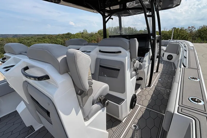 Slide: The Image of 2022 Fountain 38 SC boat interior with modern seating and sleek design. - 23